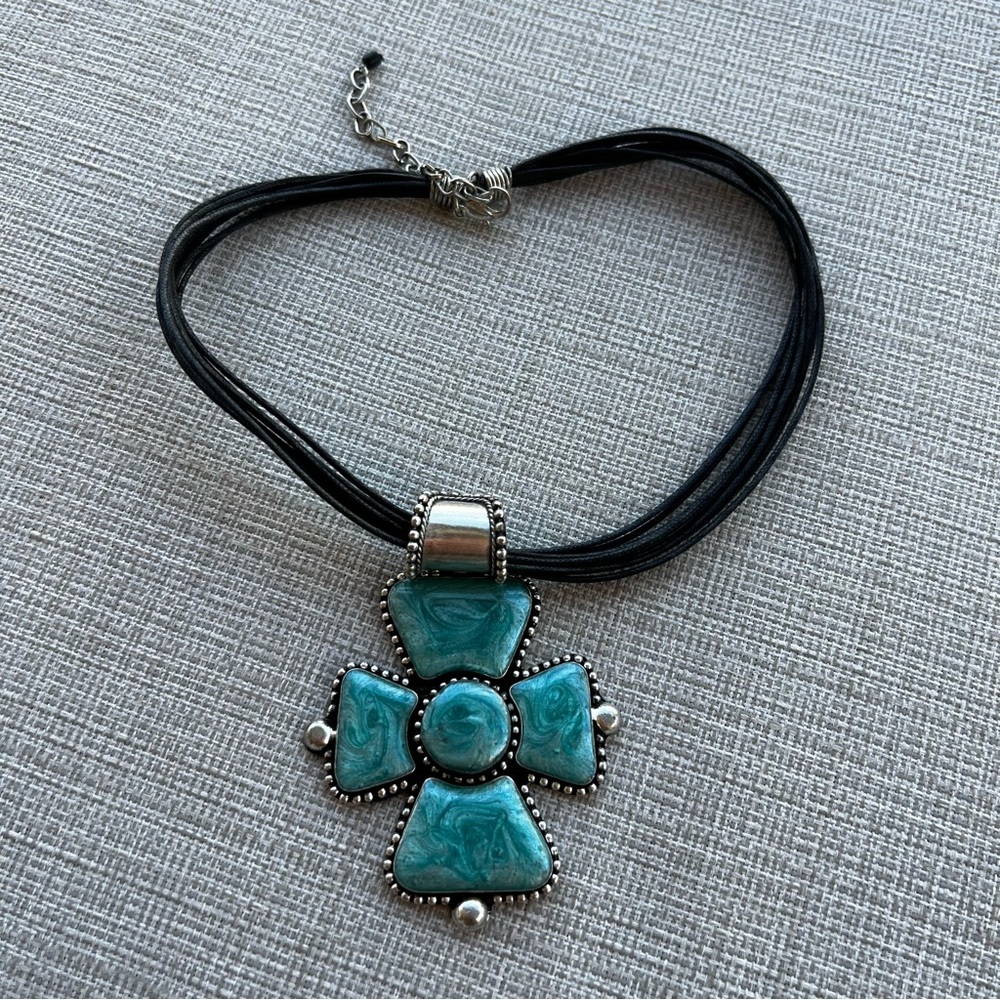 Faux Turquoise Cross Pendant Set In Silver Color Metal On 14” Black Cord